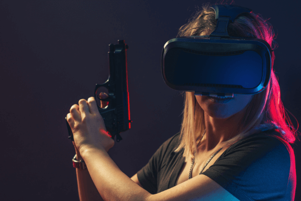 Enhanced-Gaming-VR-headset-woman-weapon